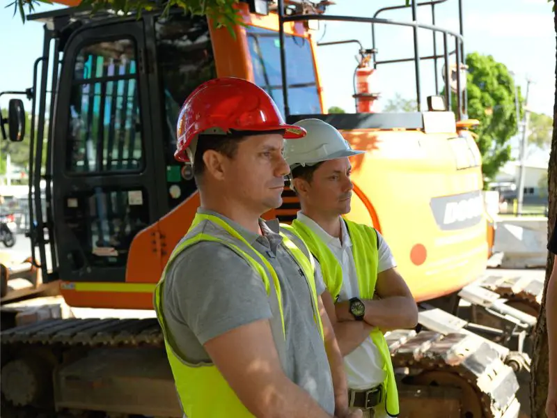 traffic-management-workers-construction-equipment-site